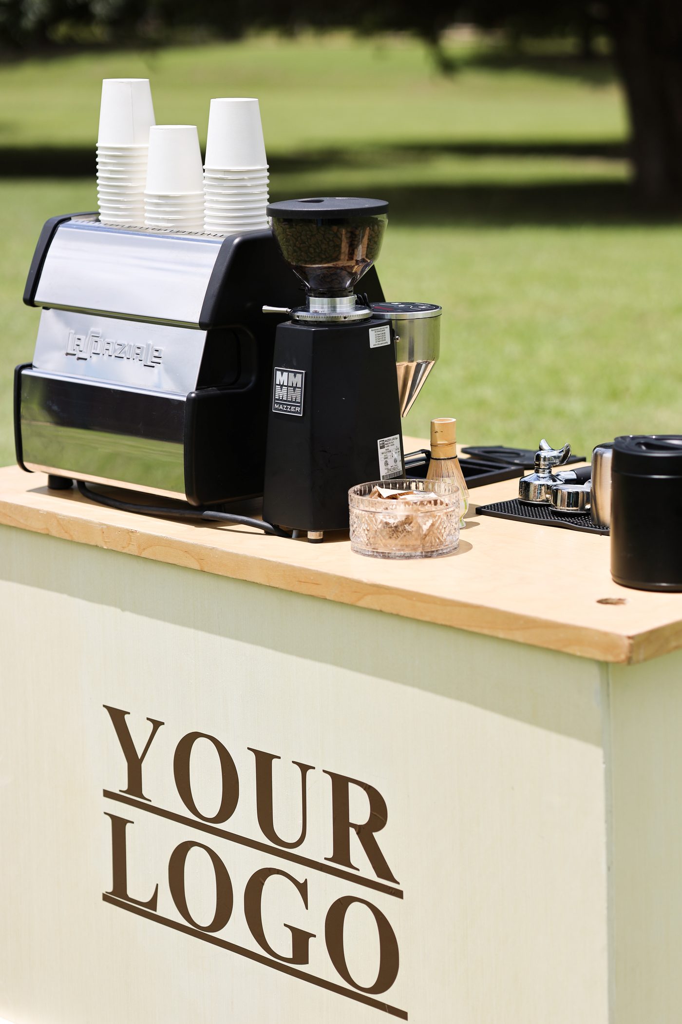 Coffee cart mocked up with placeholder logo branding on the front panel